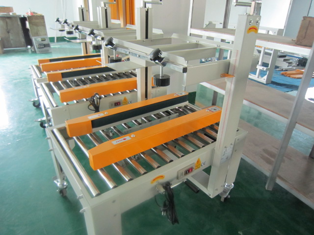 膠帶封箱機(jī)的工作原理是什么？